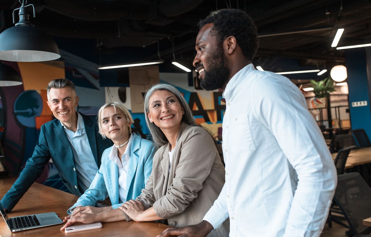 cinematic image of a multiethnic business team. employees working together in a modern office